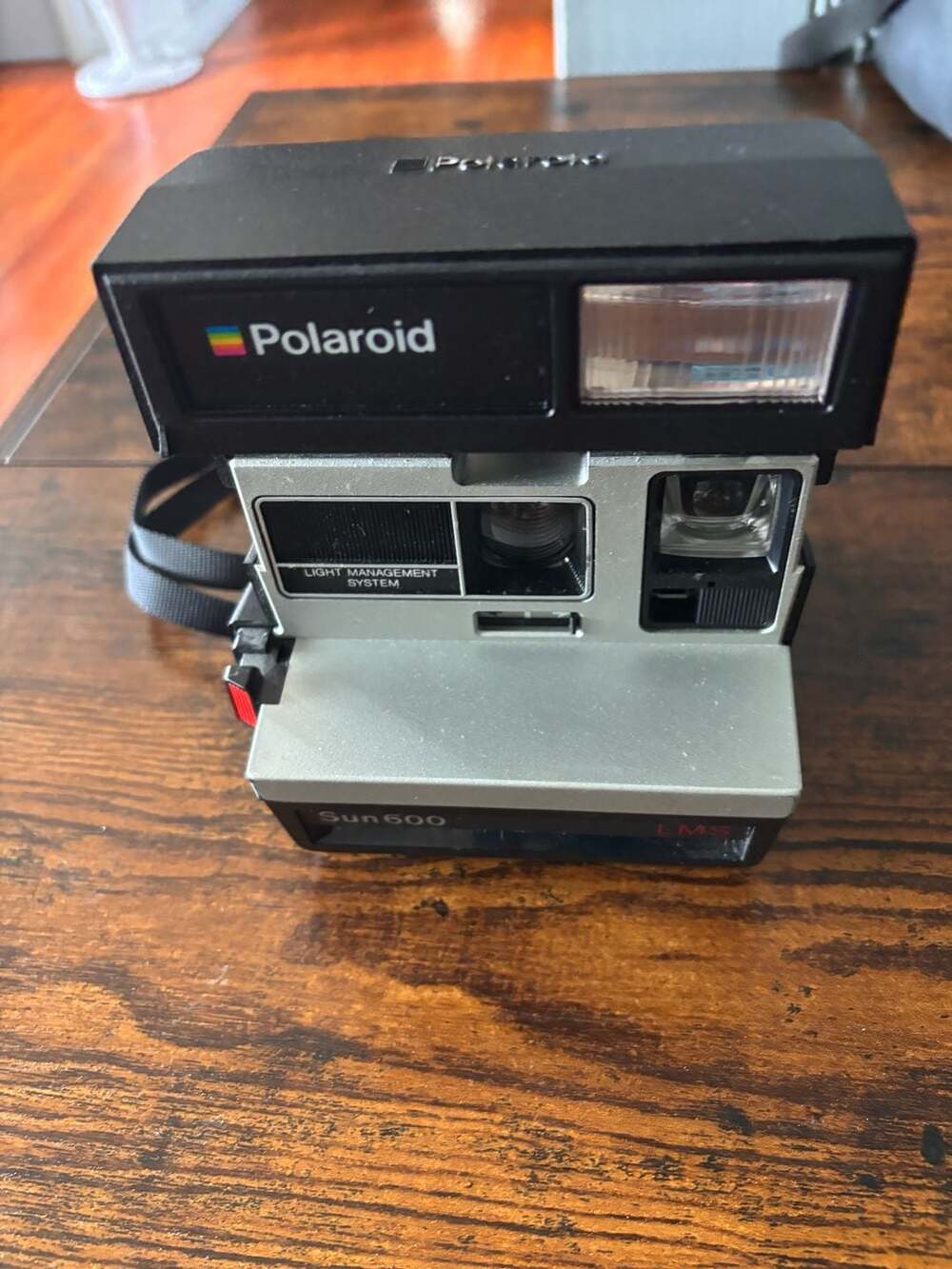 Polaroid Sun 600 LMS Instant Film Camera with Neck Strap